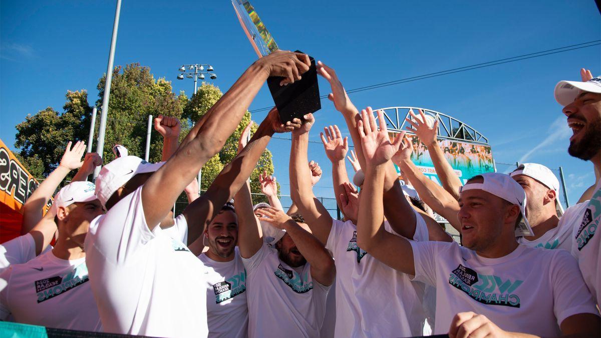 The water polo team celebrates their win after the game.